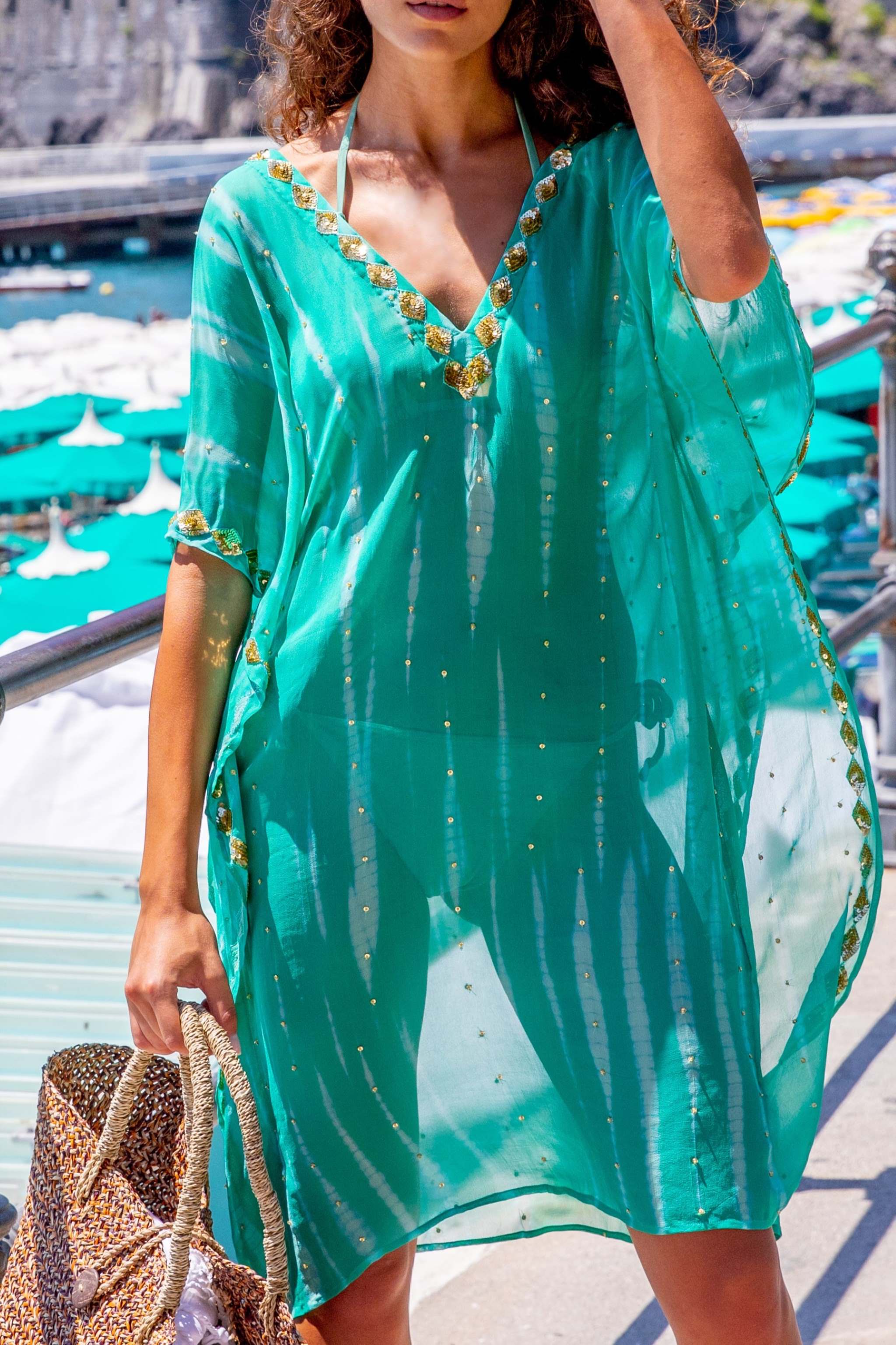 Aqua silk floaty kaftans to wear on holiday to the beach by lindsey brown silk resort wear