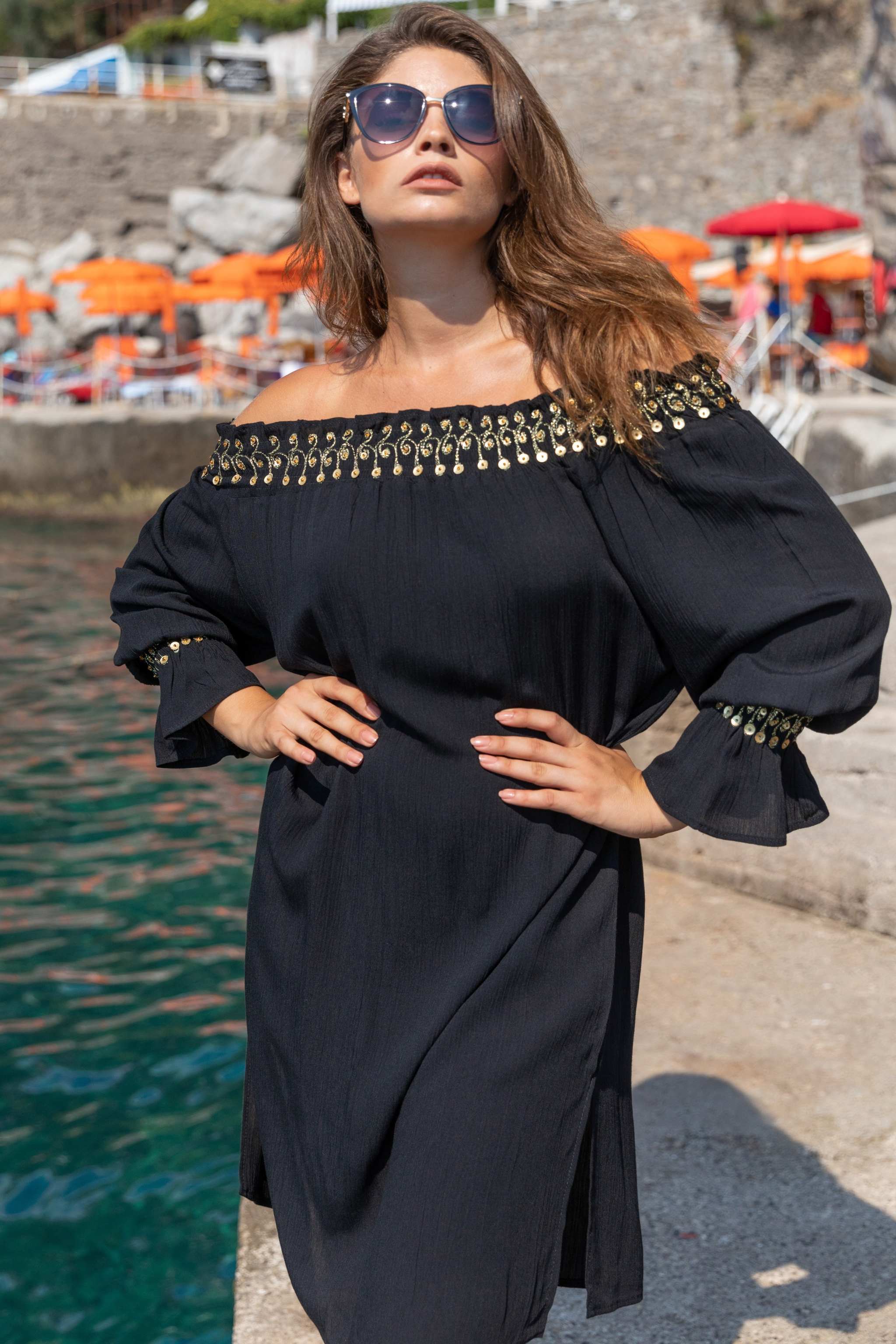 Black and gold soft cotton off the shoulder holiday dress by Lindsey Brown luxury resort wear