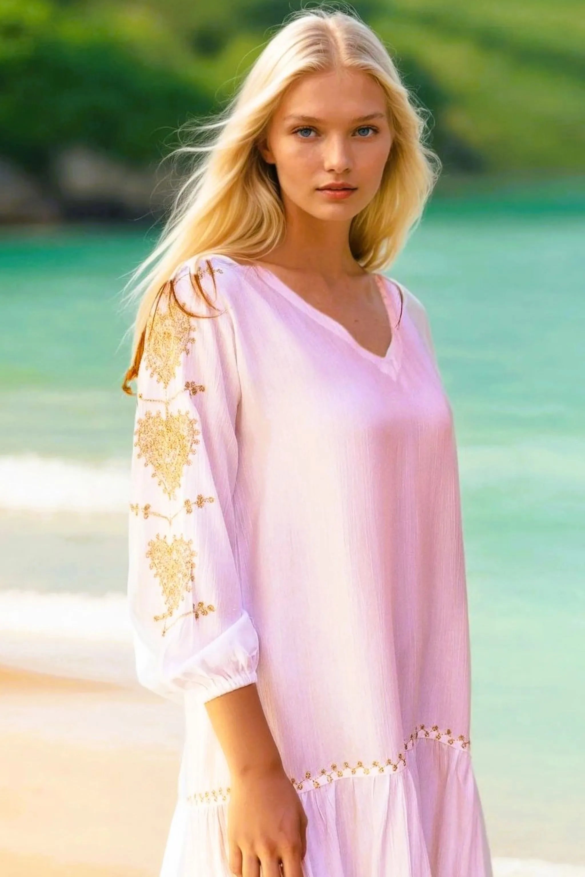 white cotton loose fitting designer beach dresses by Lindsey Brown resort wear