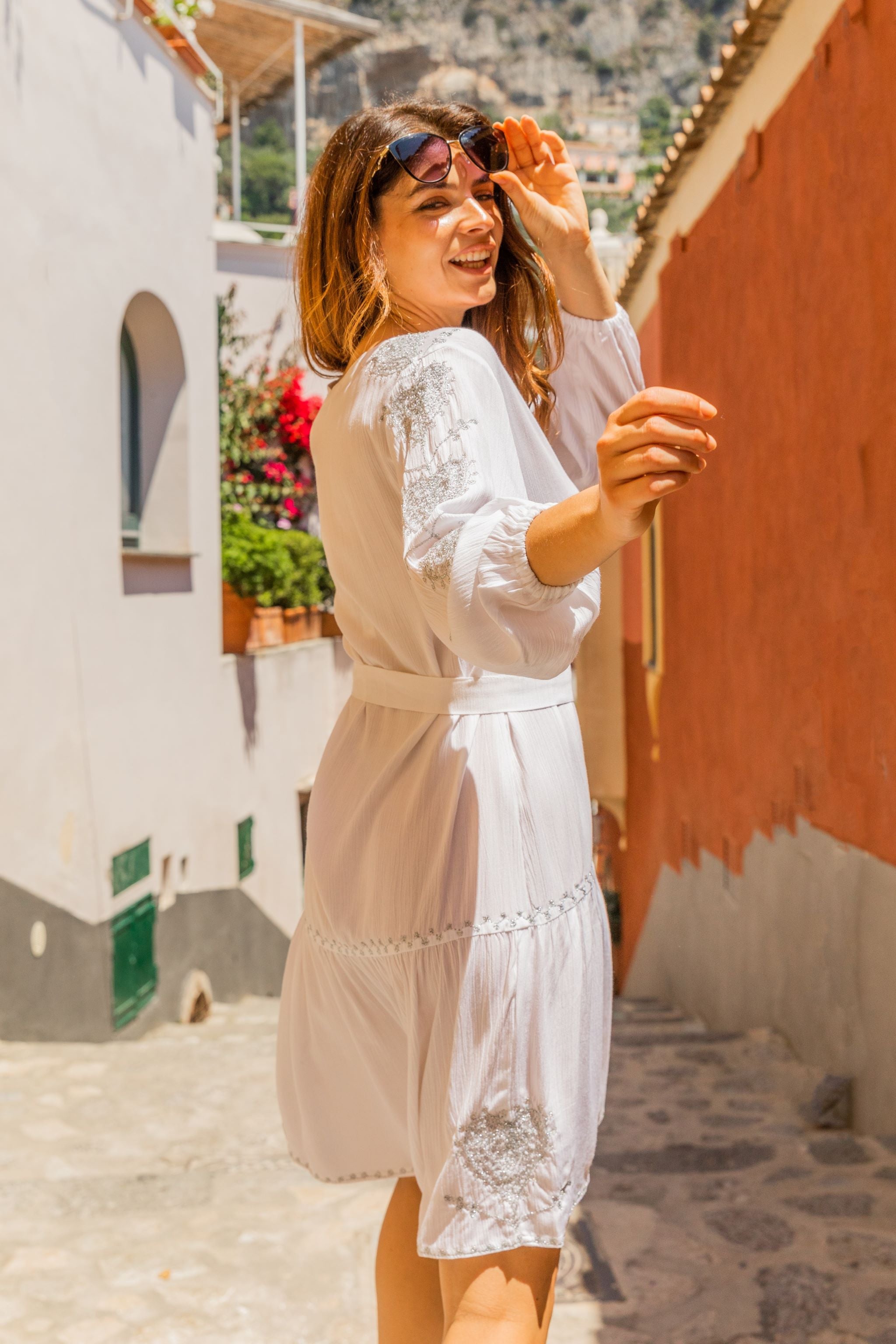 White silver cotton beach dress to wear on holiday by Lindsey Brown 